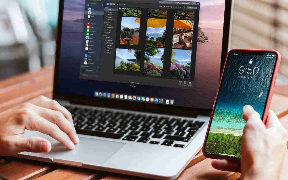 hands on computer and iphone using Imazing