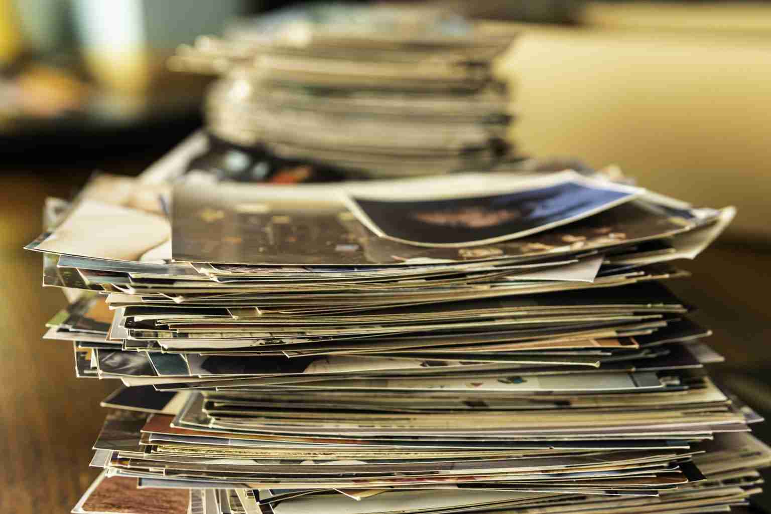 a stack of old photos