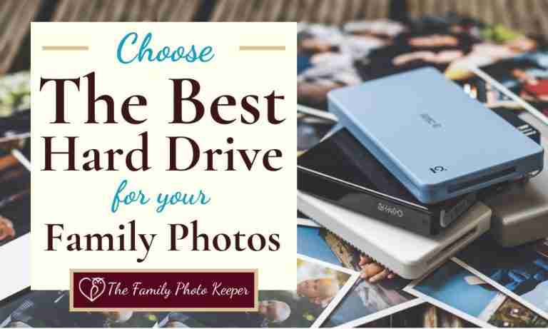 a stack of external hard drives on top of scattered family photos